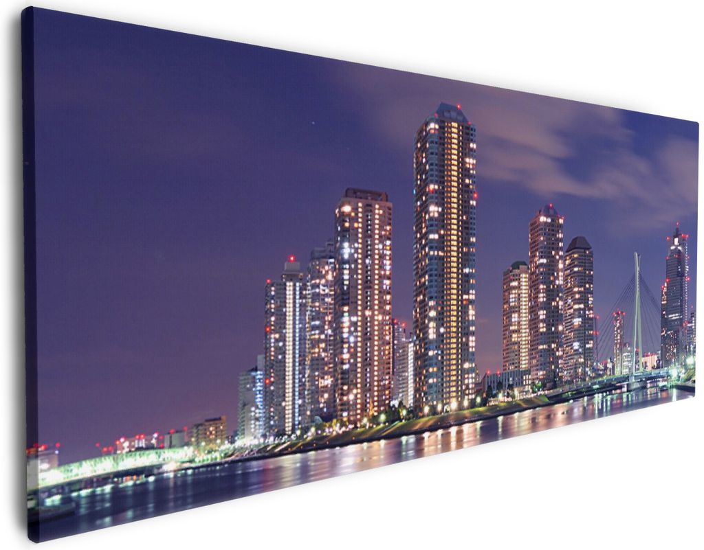 Wallario Premium Leinwandbild Tokyo- Skyline bei Nacht in Größe 60 x 150 cm