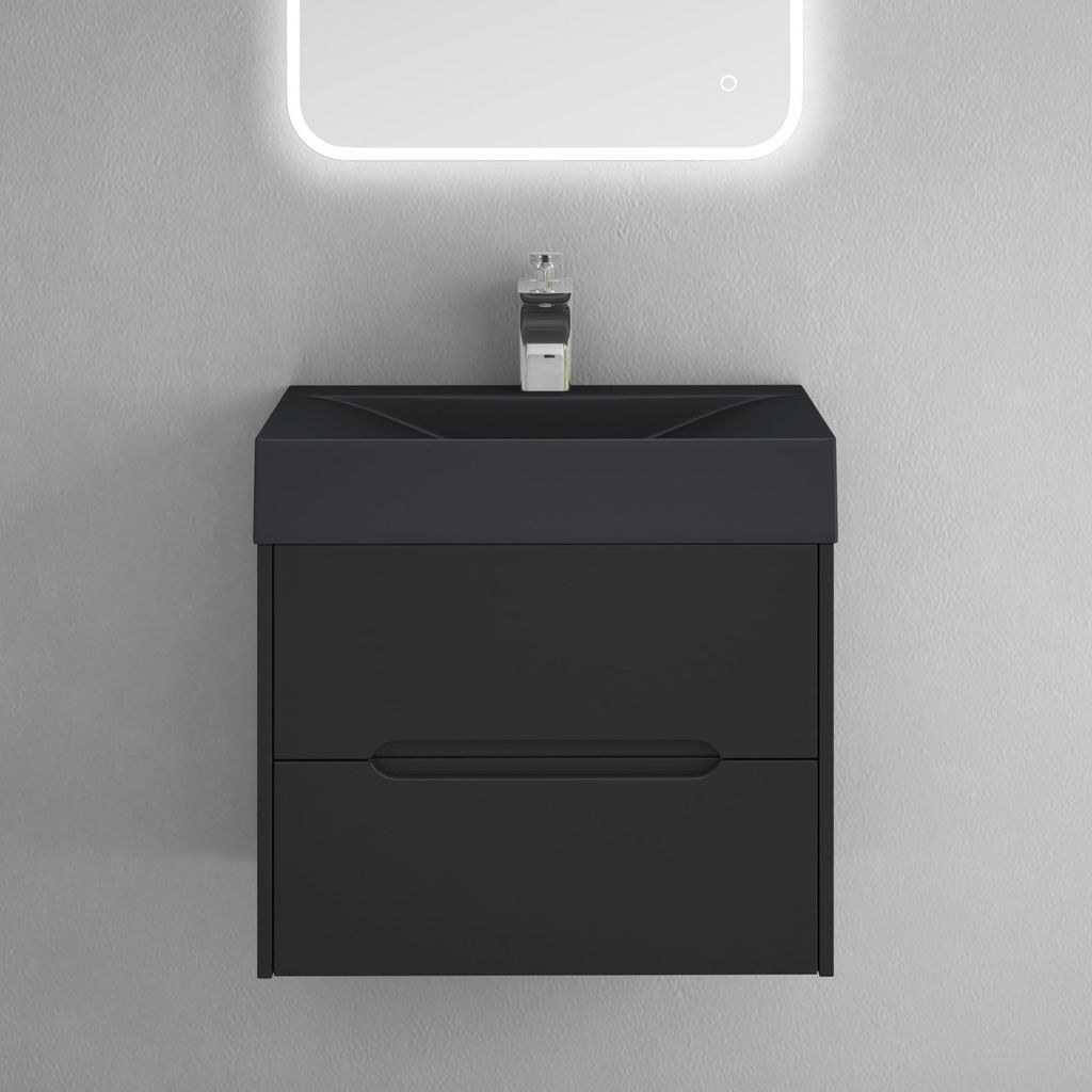 A matte black bathroom vanity with a built-in sink and a chrome faucet, set against a gray tiled wall.