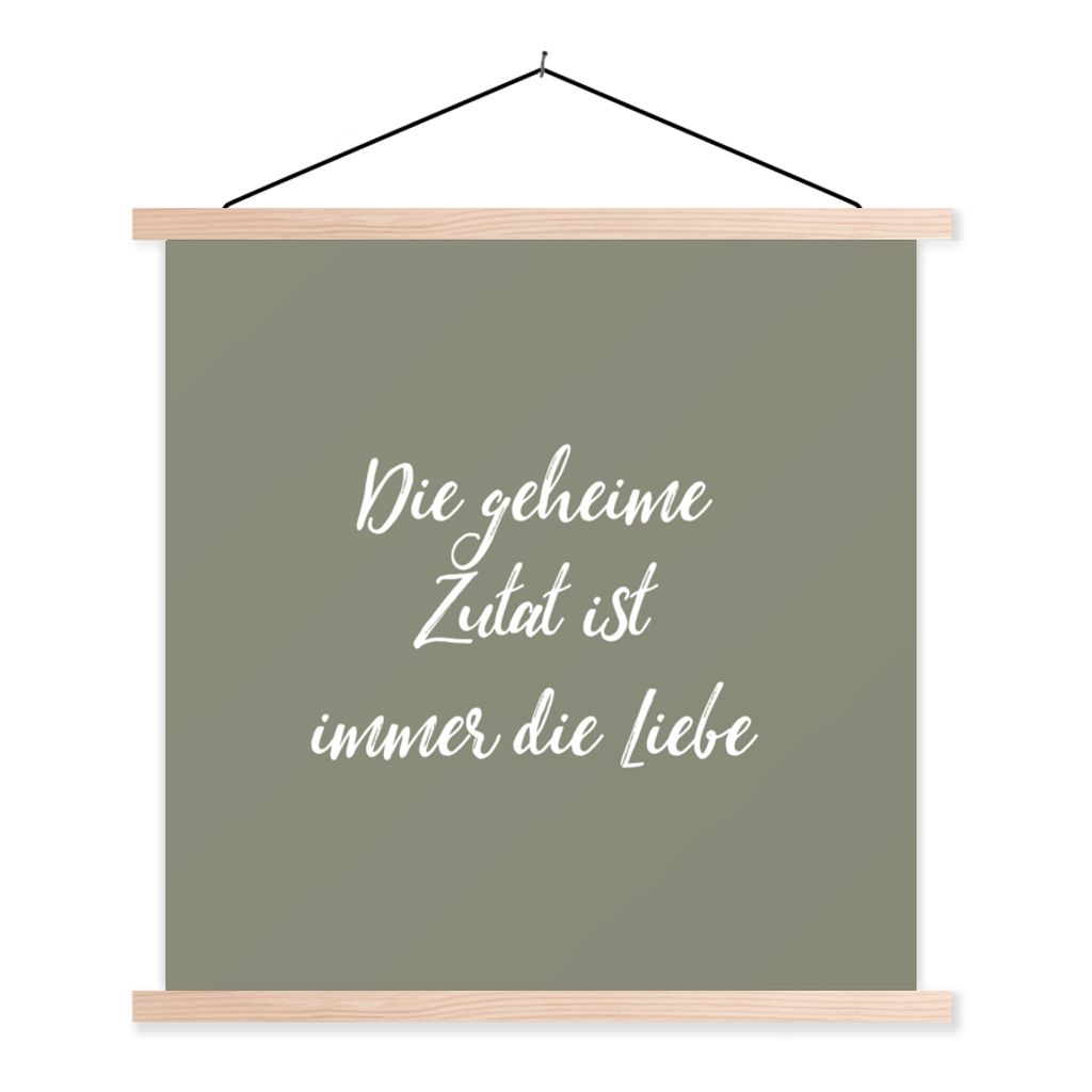 MuchoWow Textilposter Sprichwörter - Zitate - Die geheime Zutat ist immer die Liebe - Liebe 40x40 cm mit holzfarbenen Rahmen - Posterleiste