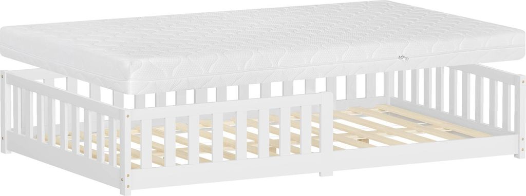 A white wooden children's bed frame with a mattress and slatted base, shown from a side angle against a white background.