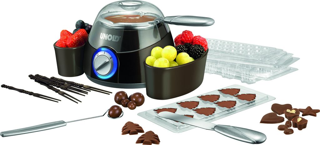 Das Unold Chocolatier-Set umfasst einen Schmelztiegel, Schokoladenformen, zwei Metallutensilien, Sch