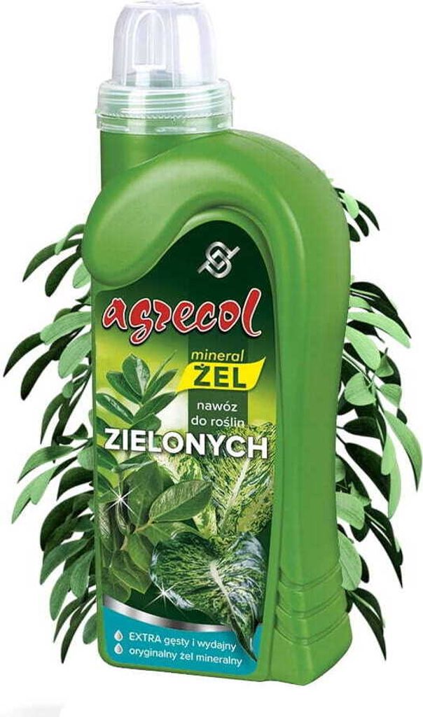 A green bottle of liquid fertilizer with a label showing plant leaves, surrounded by green leaves.