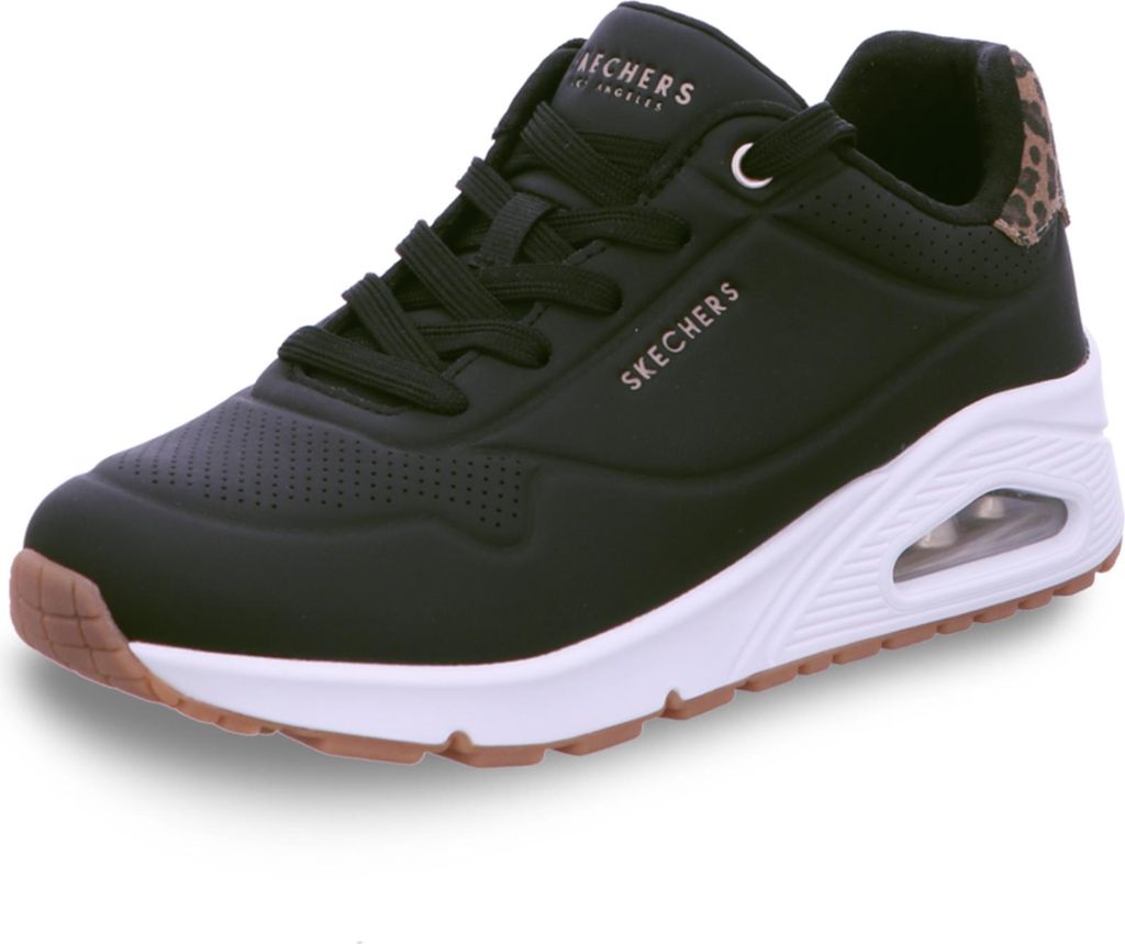 A studio shot of a black Skechers sneaker.