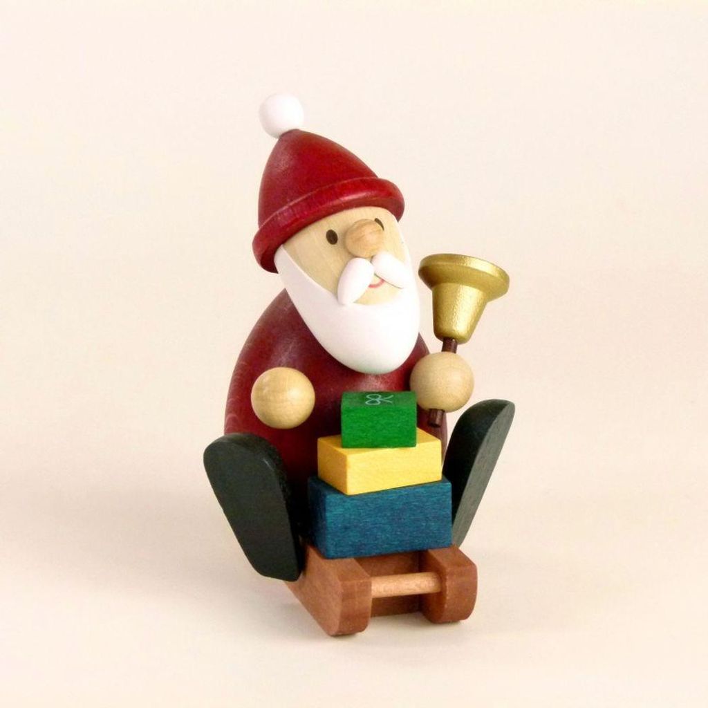 Weihnachtsmann auf Schlitten mit Glocke und Geschenken Produktbild 