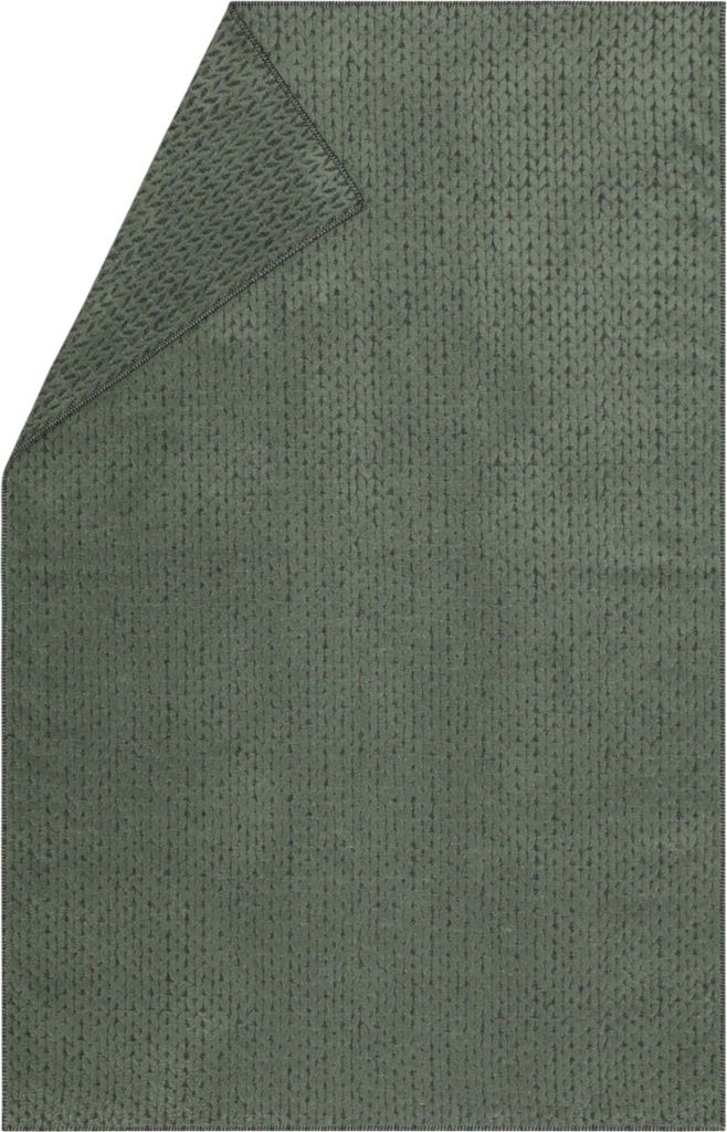 A folded green knitted blanket.