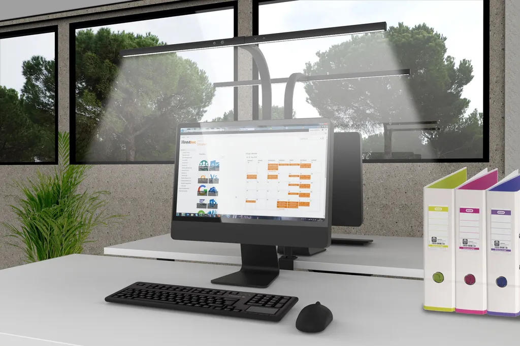 Unilux STRATA Lampe LED noire à bras articulé et éclairage asymétrique