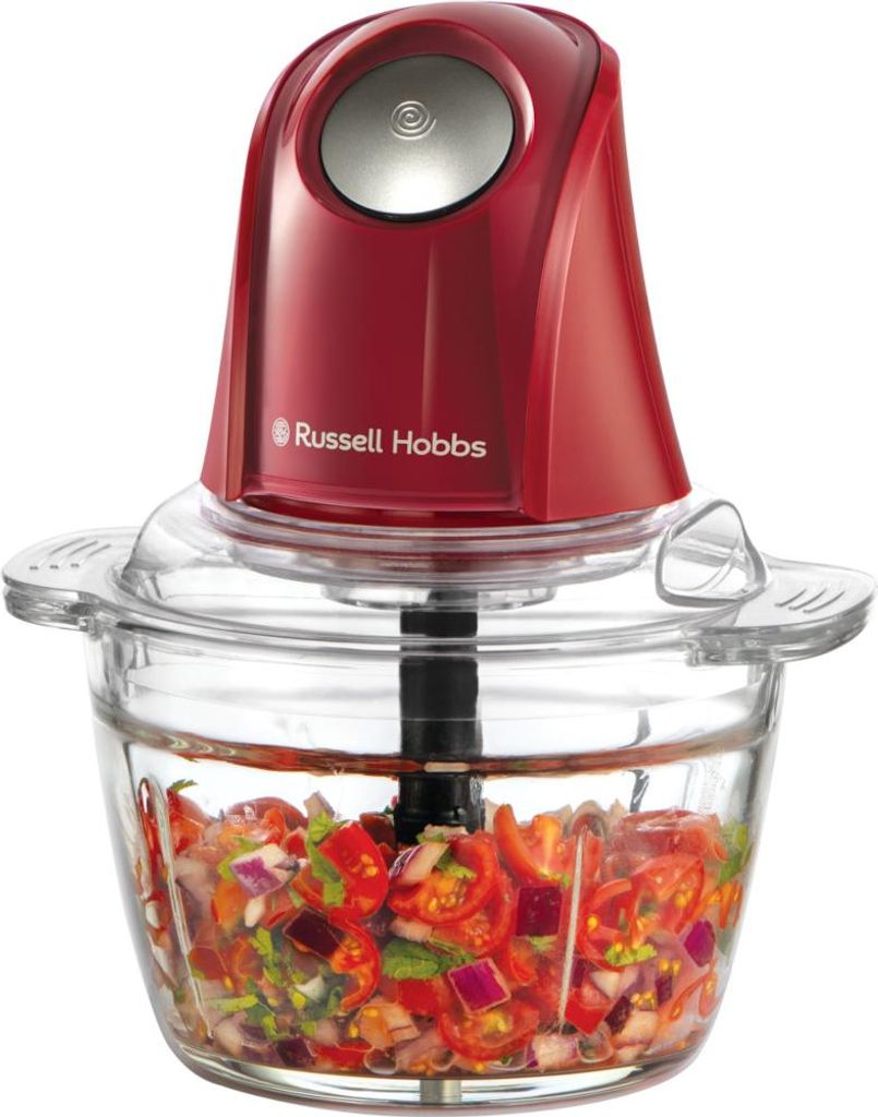 A red Russell Hobbs mini food chopper filled with chopped tomatoes, red onions, and herbs, shown against a white background.