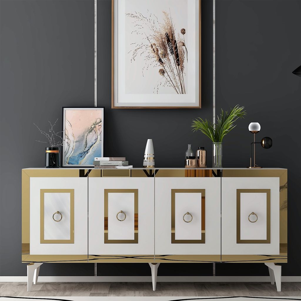 A white and gold sideboard with decorative items on top, set against a dark gray wall.