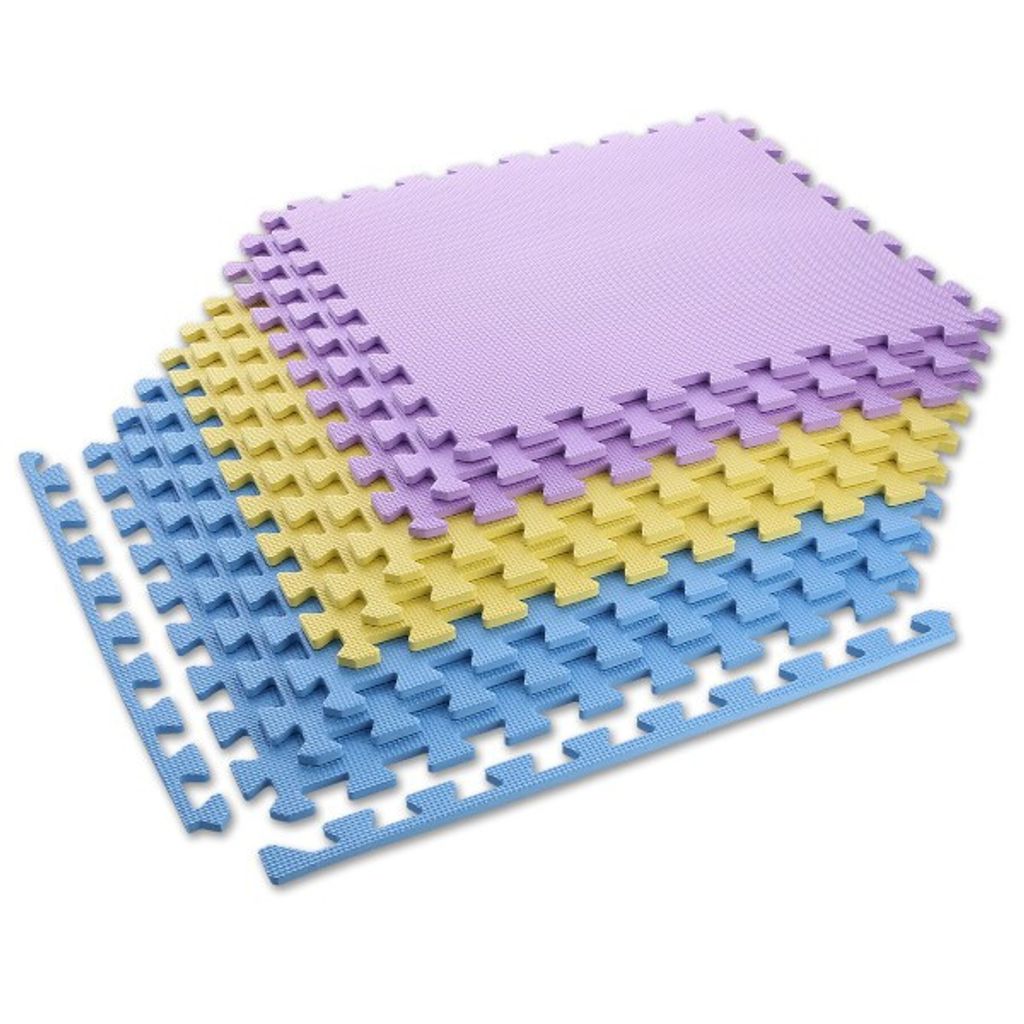 A stack of interlocking foam puzzle mats in purple, yellow, and blue.