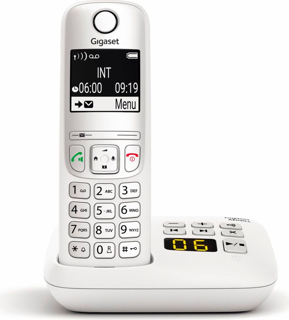 A white cordless phone and its charging base are displayed against a white background.