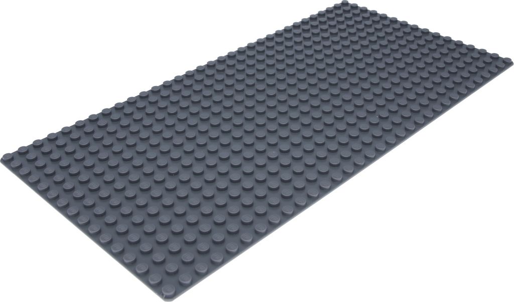 A dark gray LEGO baseplate is shown from a diagonal angle against a white background.