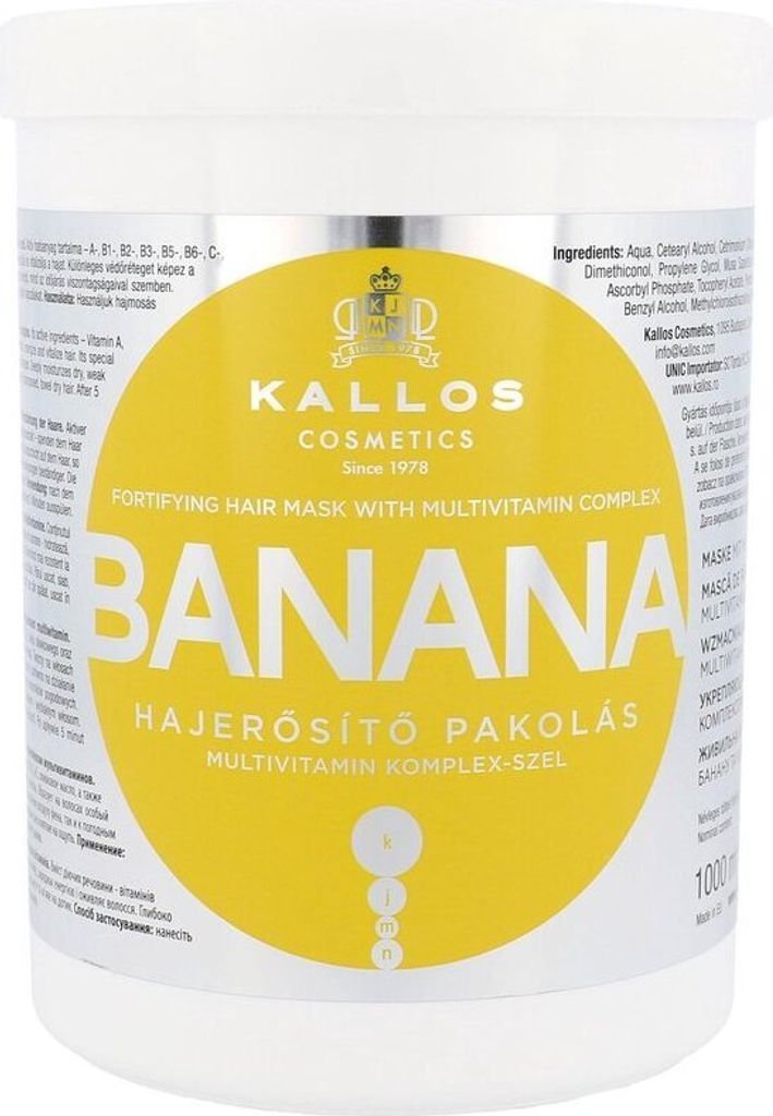 A white tub of Kallos Banana Hair Mask with a large yellow circular label featuring the product name and branding.