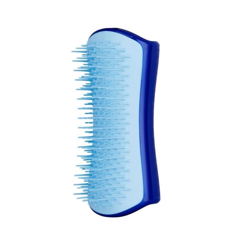 A blue and light blue hair brush is shown against a white background.