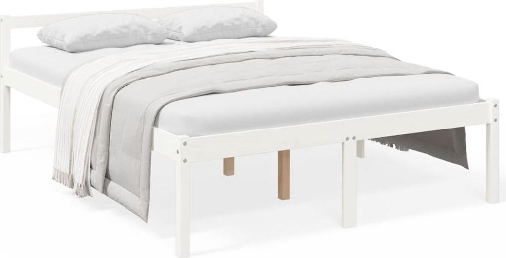 A white wooden bed frame with two pillows and a blanket.