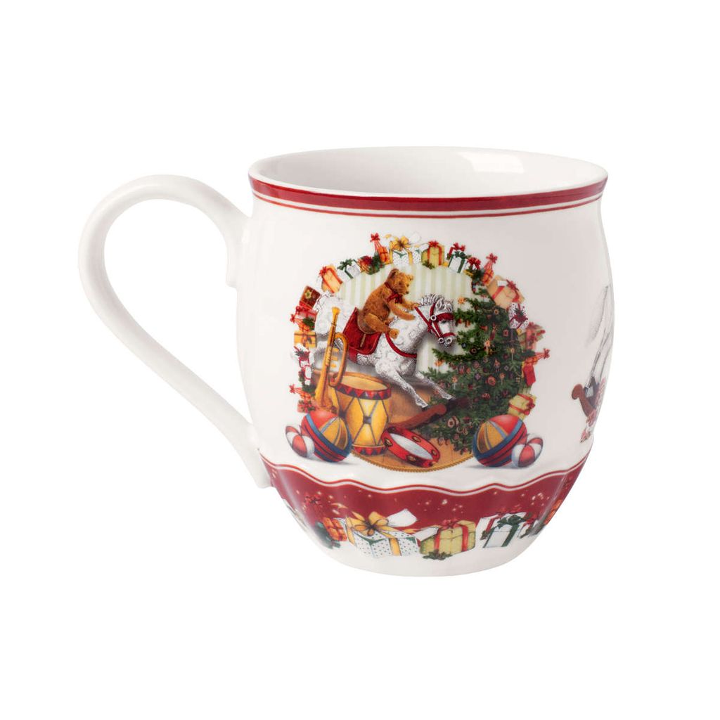 A white ceramic mug with a festive Christmas-themed illustration.