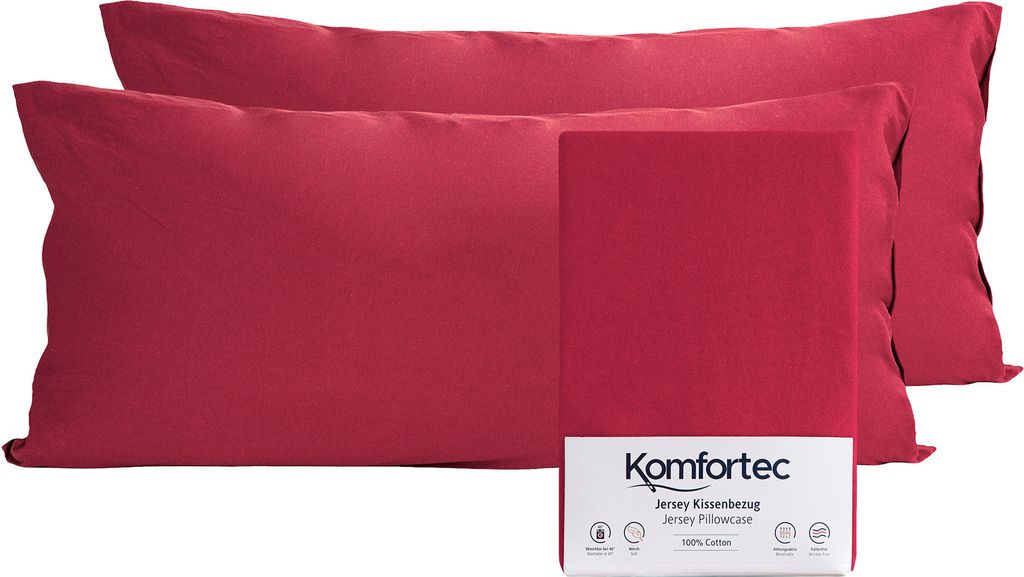 Two red pillowcases are shown, with one folded and placed in front of the other. A small packaging box with the brand logo and product details is also visible.