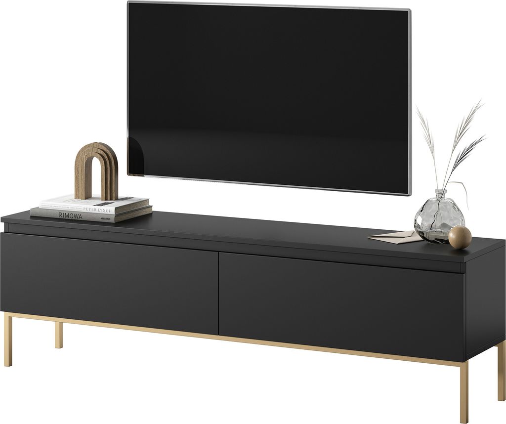 A modern black TV lowboard with gold metal legs, featuring a television on top and decorative items.