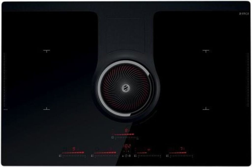 A top-down view of a black induction cooktop with an integrated ventilation system.