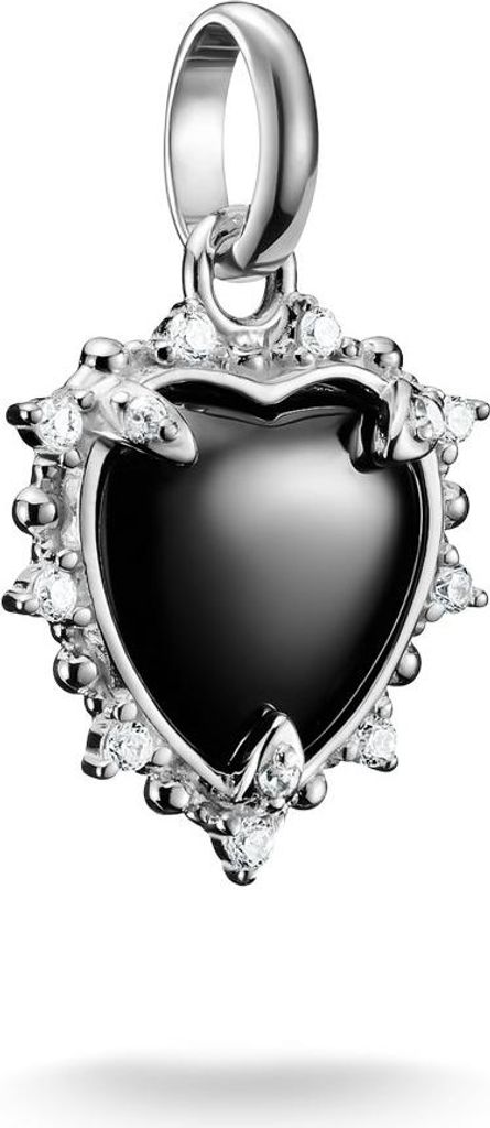 A close-up studio shot of a heart-shaped pendant with black enamel and clear stones, attached to a silver bail.