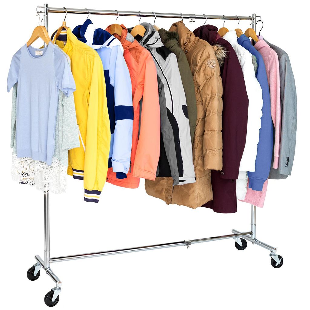 A clothing rack with various garments hanging on it.