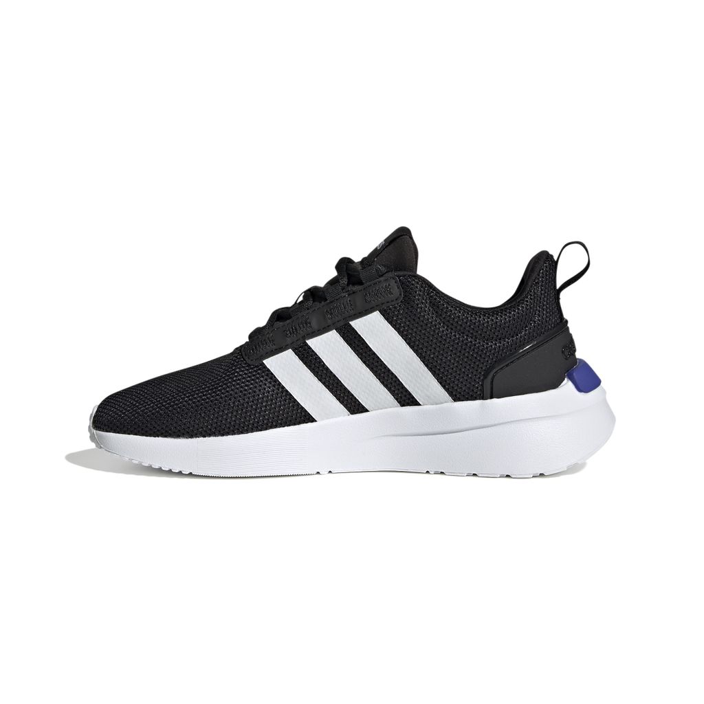 A side view of a black Adidas sneaker with white stripes and a white sole.