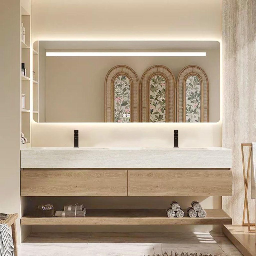 A modern bathroom vanity with a double sink, mirror, and integrated lighting.