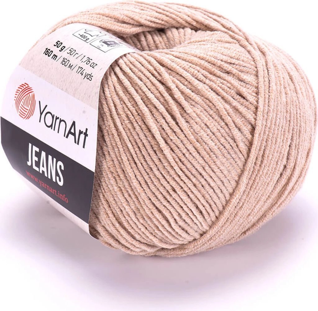 A ball of beige yarn with a label.
