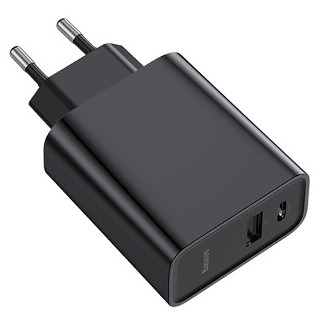 A black USB charger with two ports and foldable prongs.