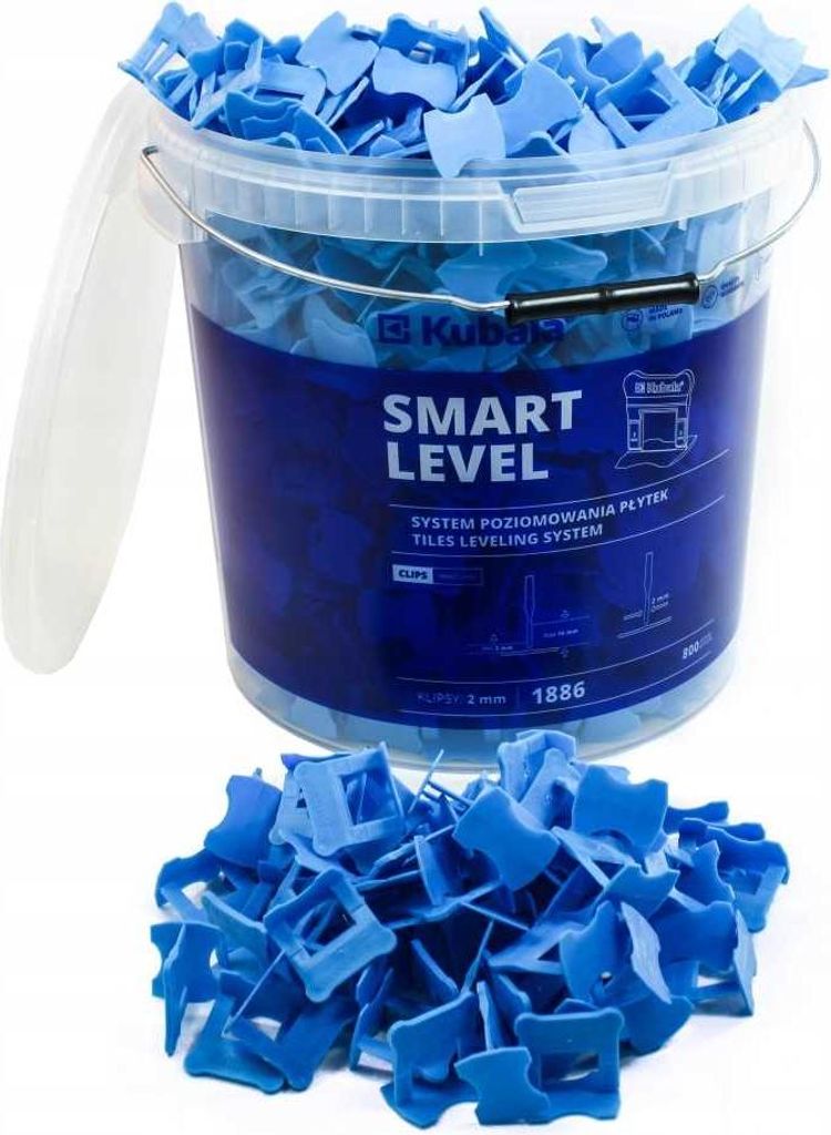 A bucket full of blue tile leveling clips, with a pile of clips in front of it.
