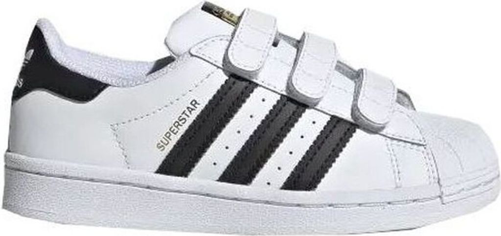 A white and black Adidas Superstar sneaker with velcro straps.