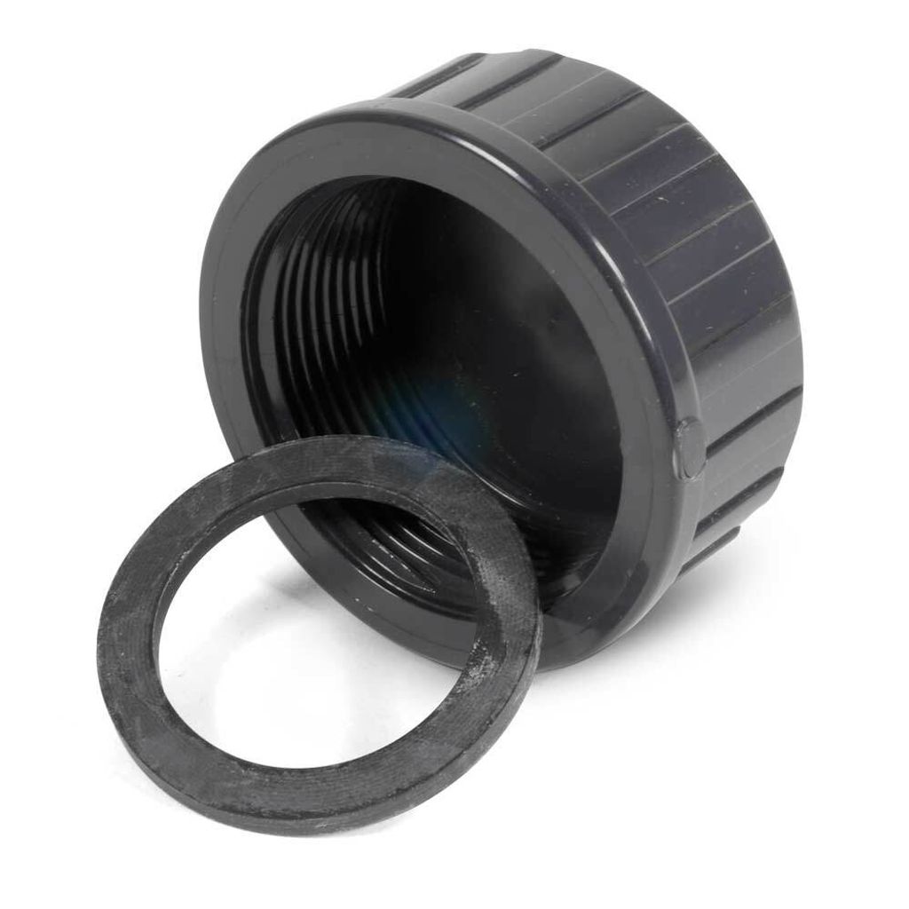 A dark gray threaded cap with a black rubber washer next to it, isolated on a white background.