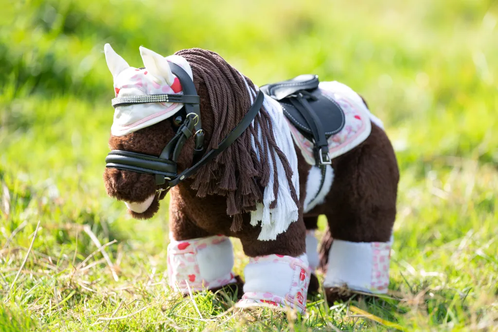 Accessoires de pansage Cuddle Pony blanc/rose au design doux et robuste