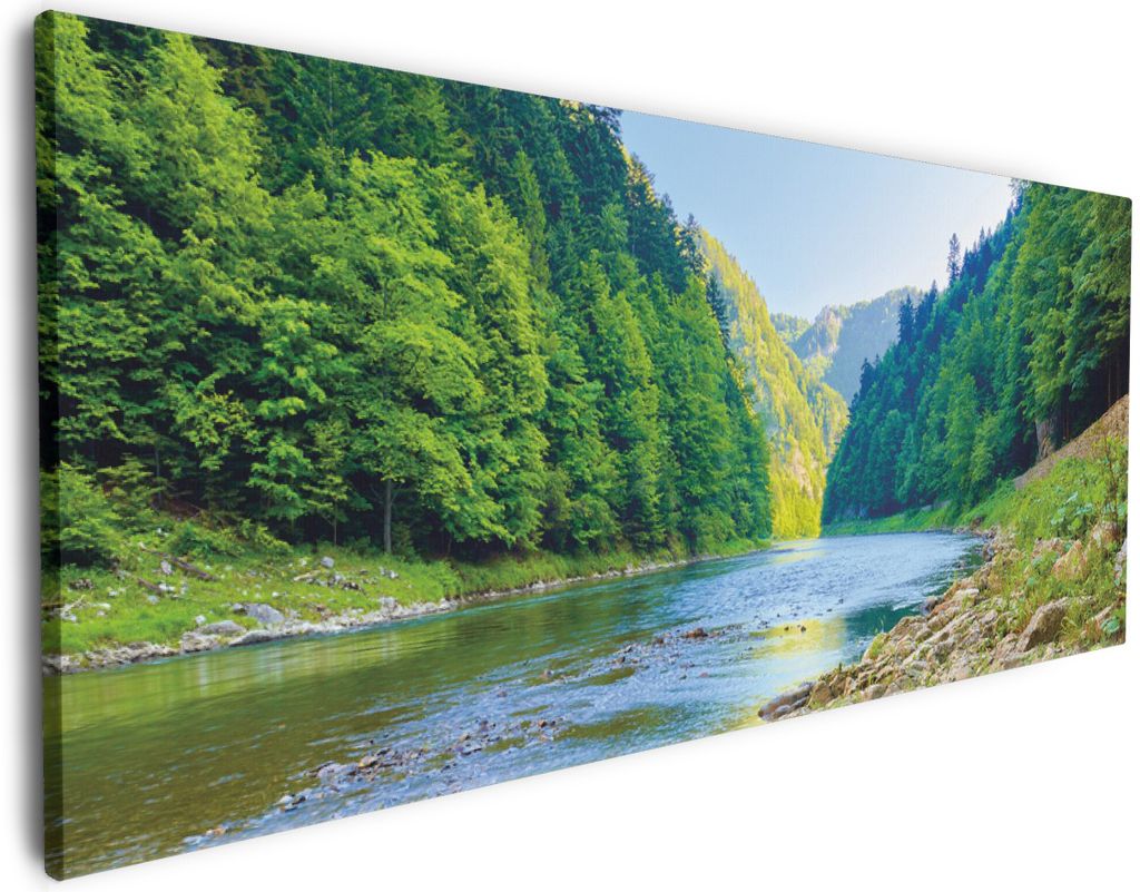 Wallario Premium Leinwandbild Fluss in den Bergen an steinigem Ufer in Größe 60 x 150 cm