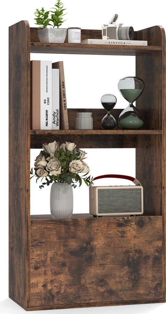 A freestanding bookshelf with three open shelves and a drawer at the bottom, displaying various decorative items.