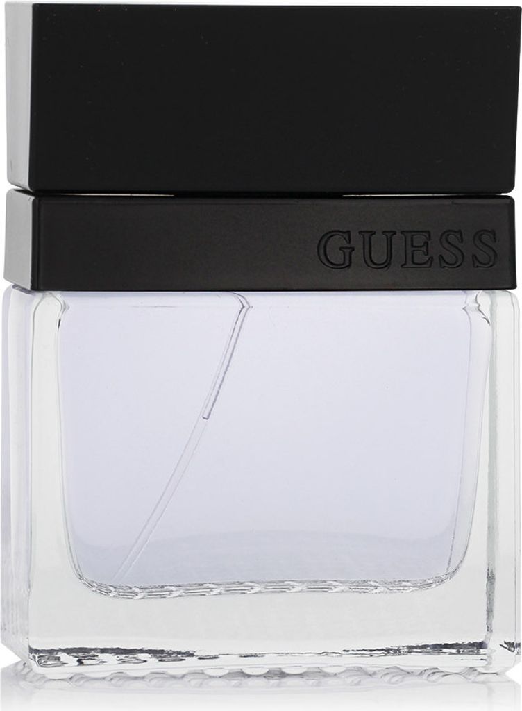 A close-up studio shot of a perfume bottle.