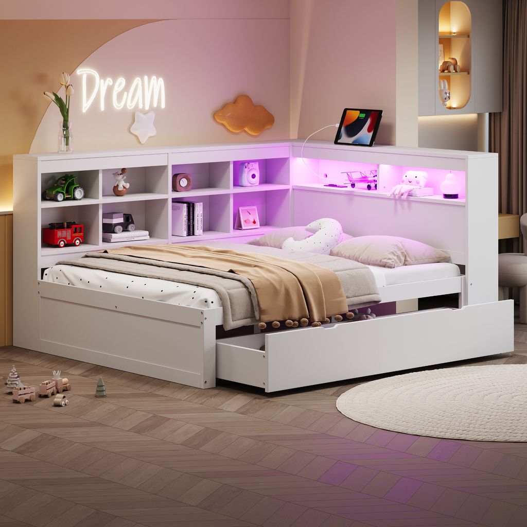 A child's bedroom with a white corner bed, shelves, and LED lighting.
