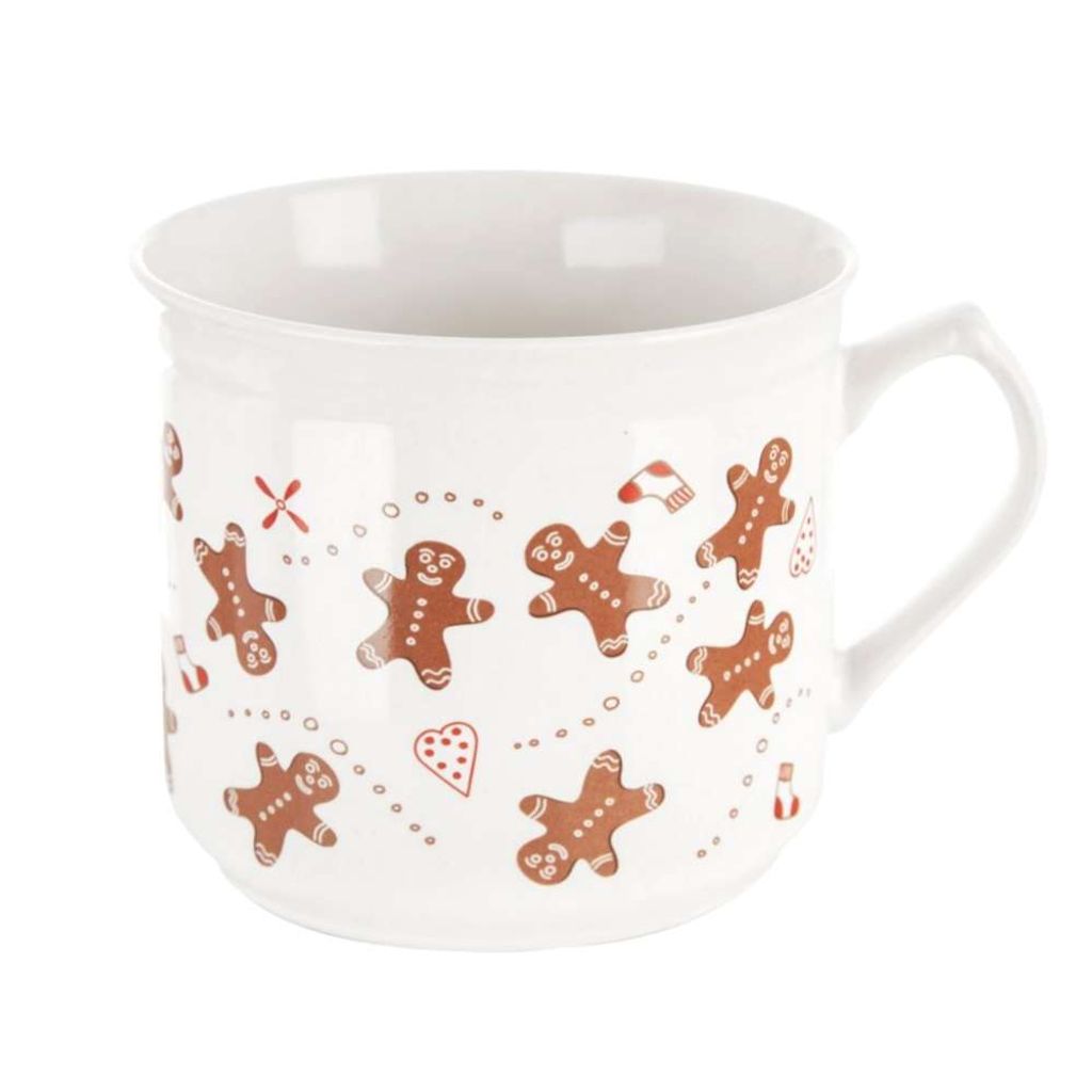 A white ceramic mug with a gingerbread man pattern.