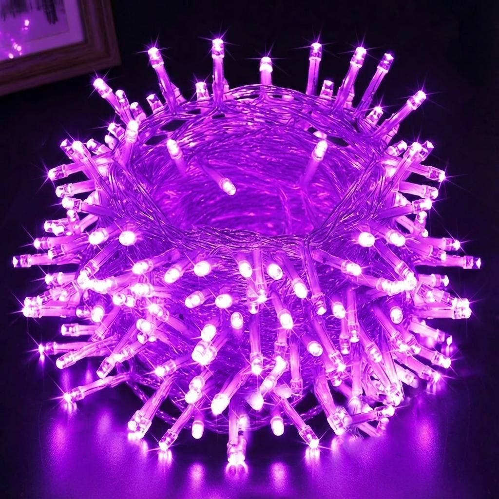 A close-up, spherical arrangement of purple LED string lights.