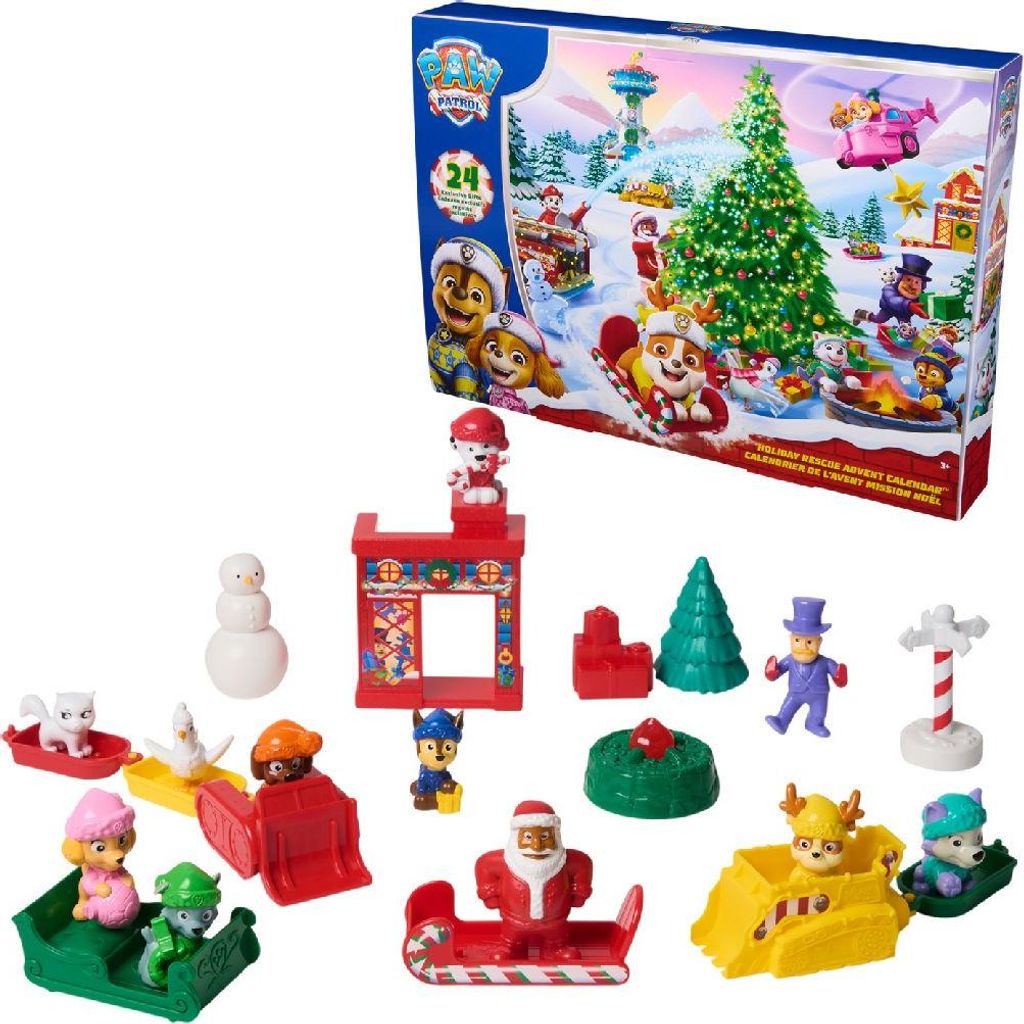 A collection of Paw Patrol advent calendar toys arranged in front of the advent calendar box.