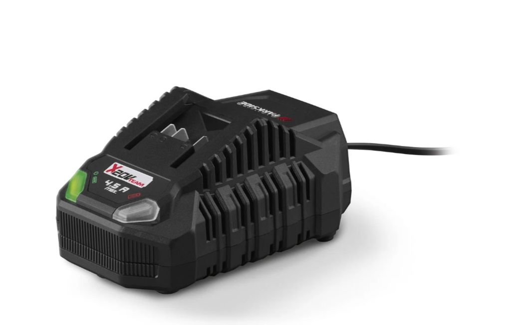 A black battery charger is shown on a white background.