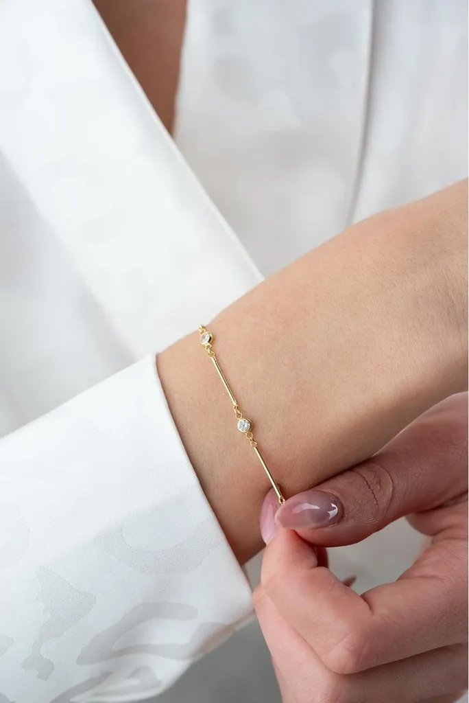 Bracelet jonc doré pour femme motif tige végétale et pierres fines