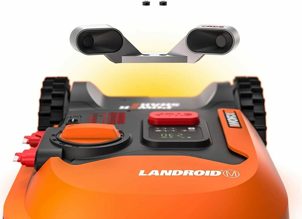 A close-up, studio shot of a robotic lawnmower accessory module.