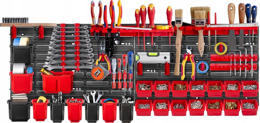 A well-organized workshop wall with various tools neatly arranged.