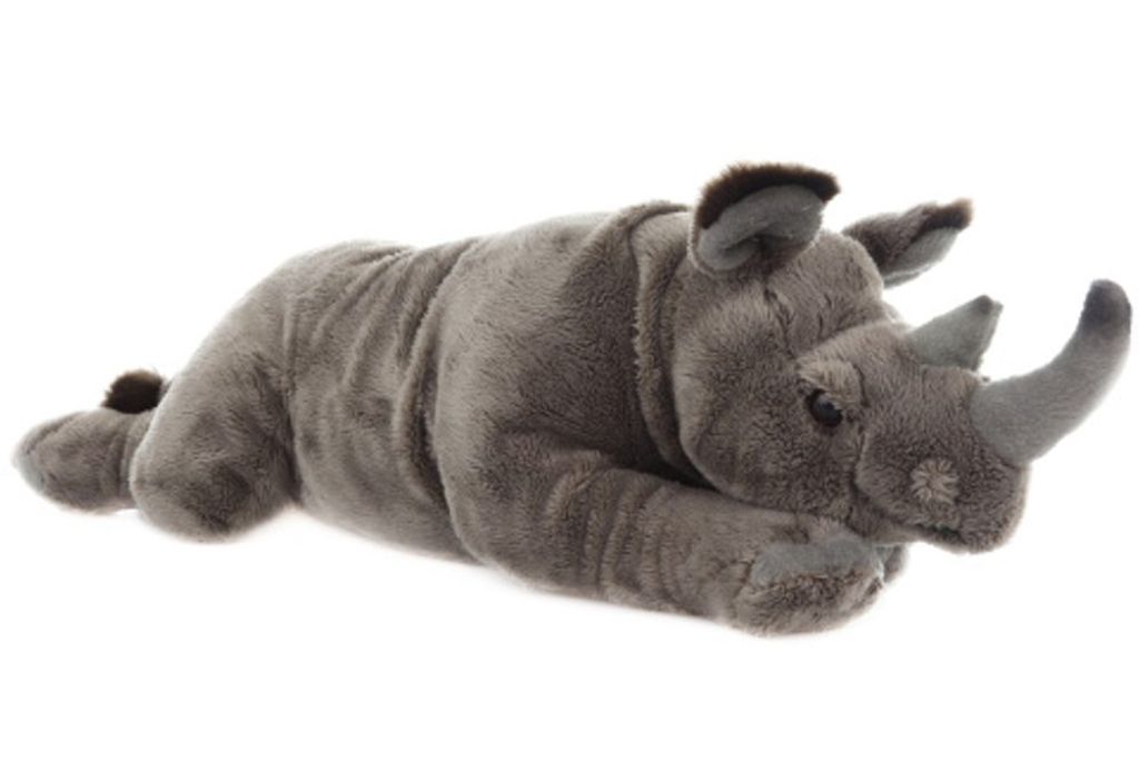 A plush toy rhinoceros lying down on a white background.
