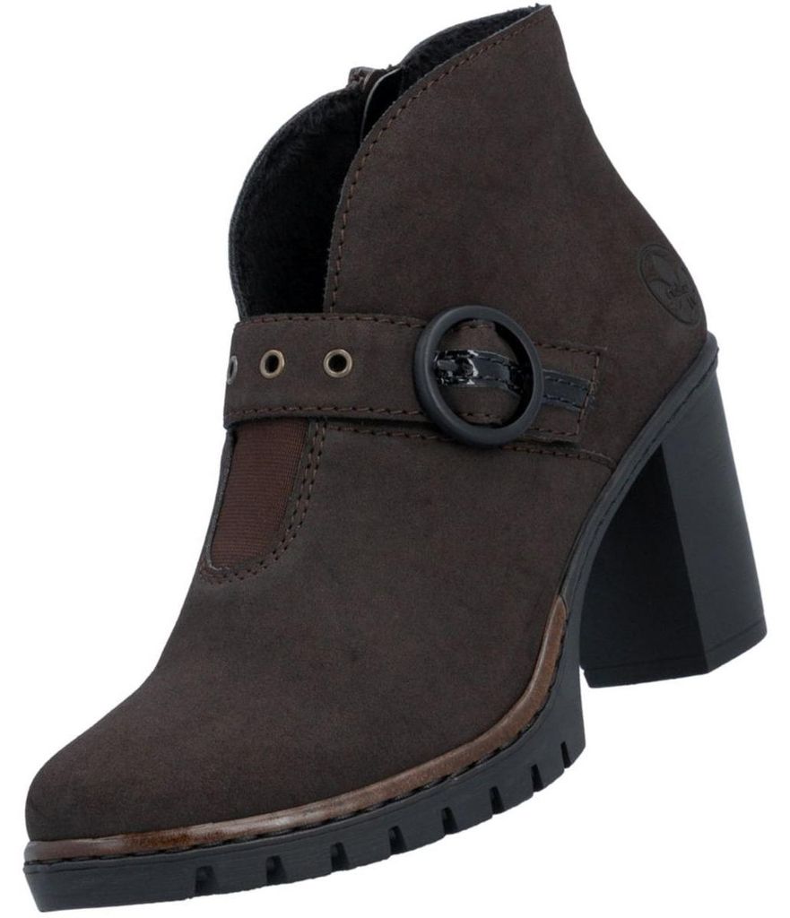 Auf dem Bild ist ein brauner Stiefel zu sehen der von der linken Seite abgebildet ist. Der Stiefel hat eine Schnürung und eine leicht profilierte Sohle.