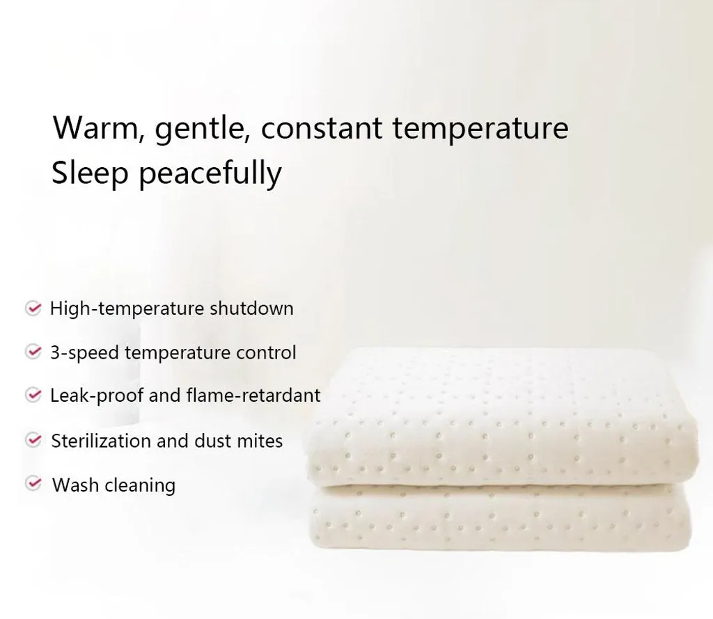 Couverture chauffante électrique beige contre les nuits froides d'hiver