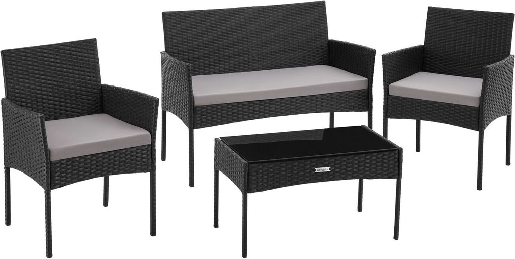 A black rattan garden furniture set with gray cushions, including two chairs, a loveseat, and a coffee table, displayed on a white background.