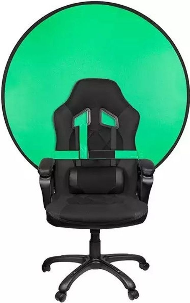A black gaming chair with a green screen backdrop.