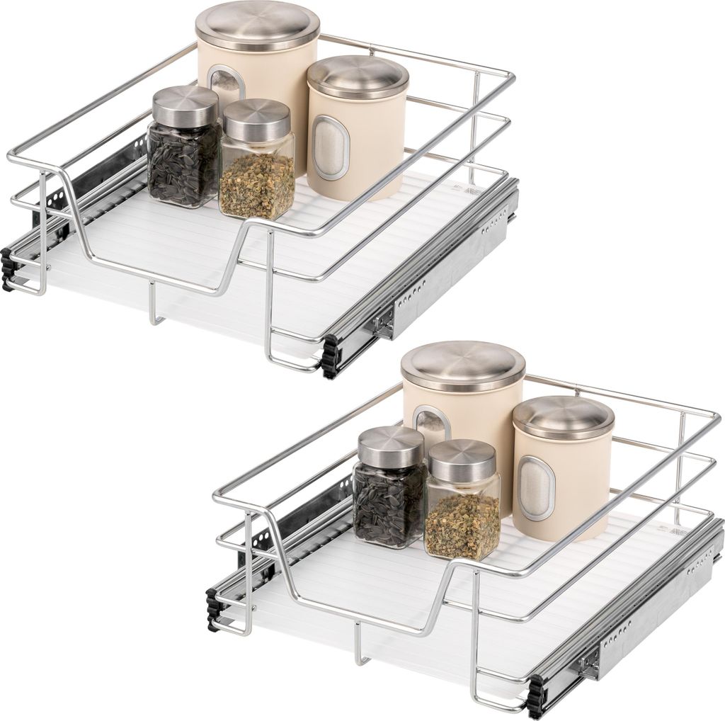Two identical sliding kitchen drawers with spice jars and canisters.
