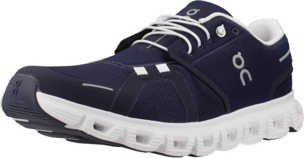 A studio shot of a single running shoe.